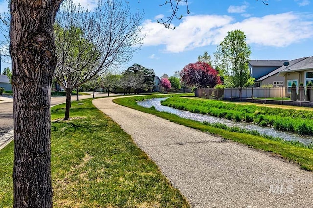 1928 E Mountain Man Dr, Meridian, ID 83646 - view of home's community featuring a yard and fence