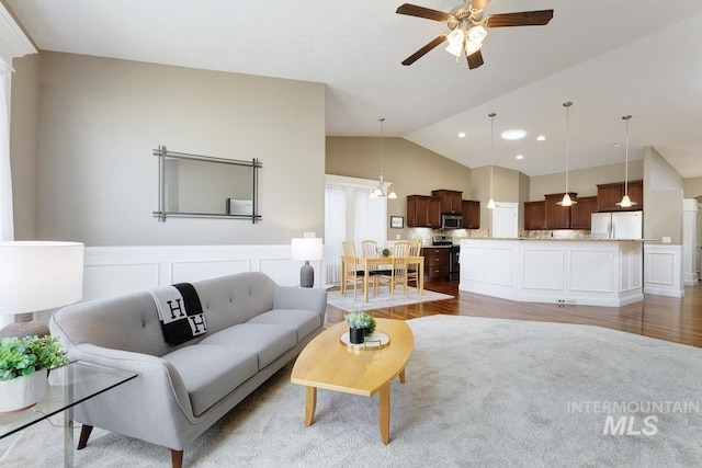 1928 E Mountain Man Dr, Meridian, ID 83646 - living area with ceiling fan, recessed lighting, wood finished floors, and lofted ceiling