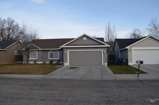 single story home with a garage and a front yard