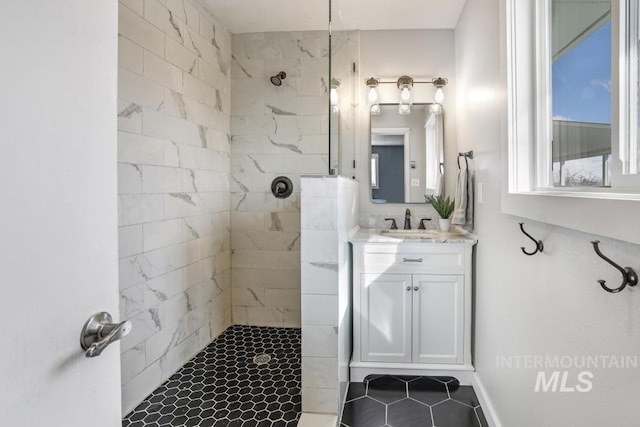 bathroom featuring vanity and walk in shower