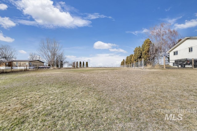 view of yard with fence