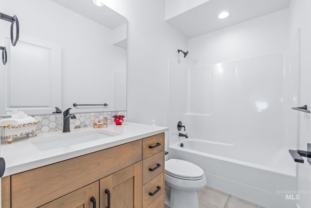 8456 W Meltwater Ln, Eagle, ID 83616 - full bath featuring vanity, toilet, shower / bath combination, tile patterned floors, and tasteful backsplash