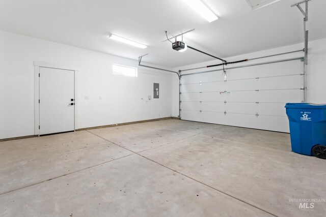 8456 W Meltwater Ln, Eagle, ID 83616 - garage featuring electric panel and a garage door opener