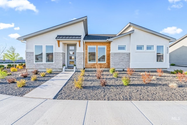 8456 W Meltwater Ln, Eagle, ID 83616 - contemporary house featuring stone siding and stucco siding
