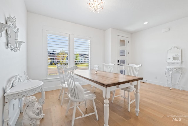 8456 W Meltwater Ln, Eagle, ID 83616 - dining area featuring light wood-style flooring, baseboards, a chandelier, and recessed lighting
