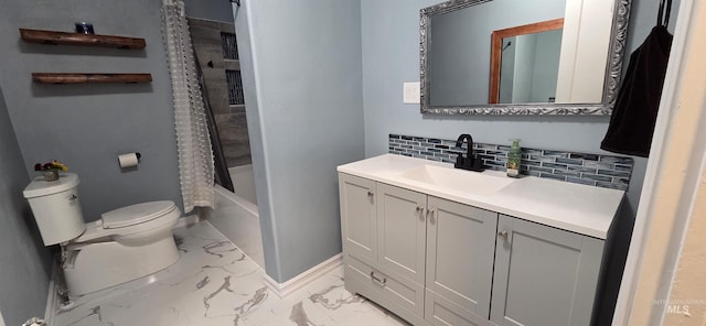 1118 10th St, Lewiston, ID 83501 - bathroom featuring marble finish floors, vanity, tasteful backsplash, and shower / bath combination with curtain