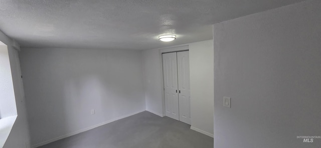 1118 10th St, Lewiston, ID 83501 - spare room featuring a textured ceiling and concrete flooring