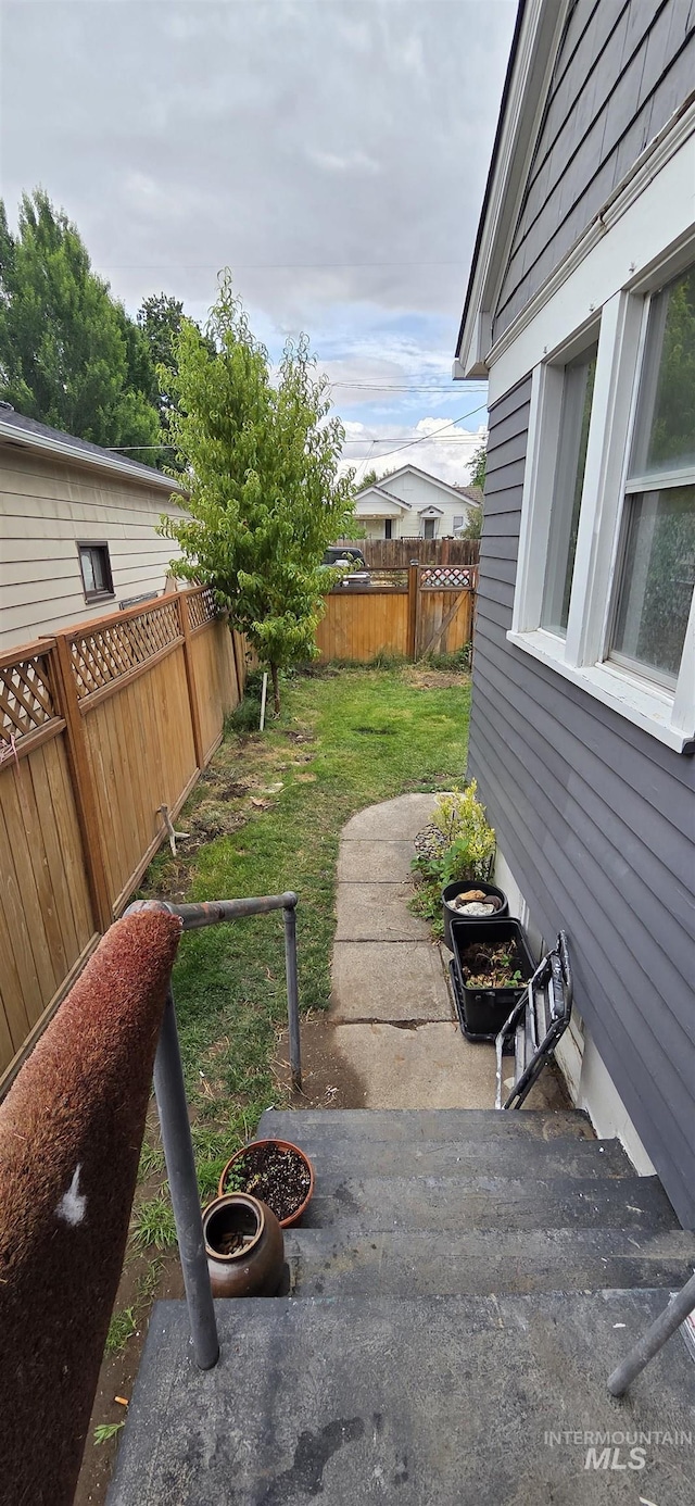 1118 10th St, Lewiston, ID 83501 - fenced backyard featuring a patio