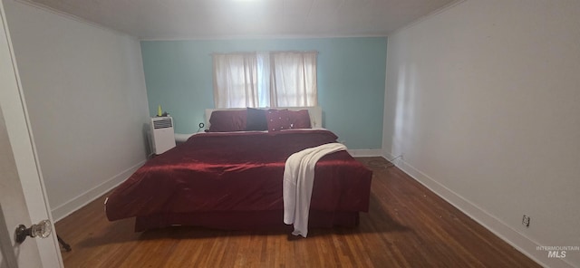 1118 10th St, Lewiston, ID 83501 - bedroom with wood finished floors and crown molding