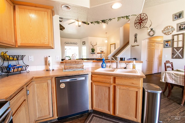 8340 E Expedition, Nampa, ID 83687 - kitchen with stainless steel dishwasher, a sink, a peninsula, dark wood-style flooring, and light brown cabinets