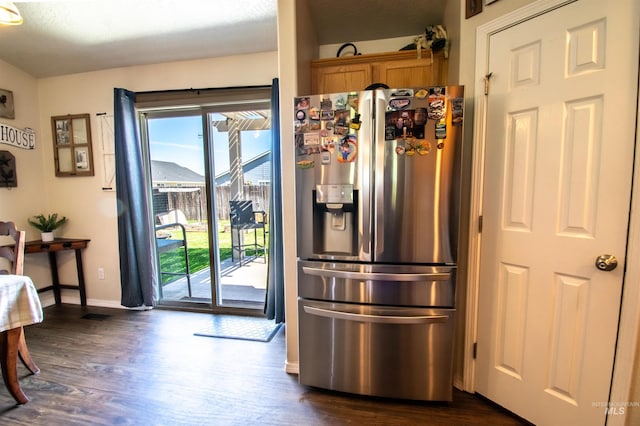 8340 E Expedition, Nampa, ID 83687 - kitchen with stainless steel fridge, dark wood-style floors, baseboards, and brown cabinetry