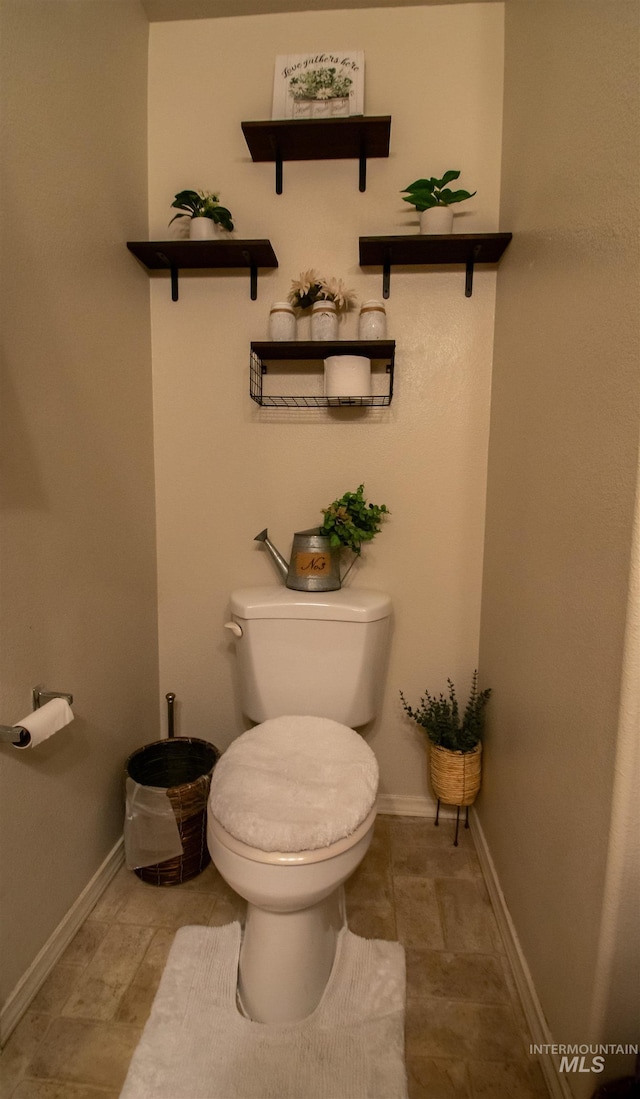 8340 E Expedition, Nampa, ID 83687 - bathroom with toilet, baseboards, and tile patterned floors