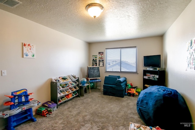 8340 E Expedition, Nampa, ID 83687 - recreation room featuring a textured ceiling and carpet floors
