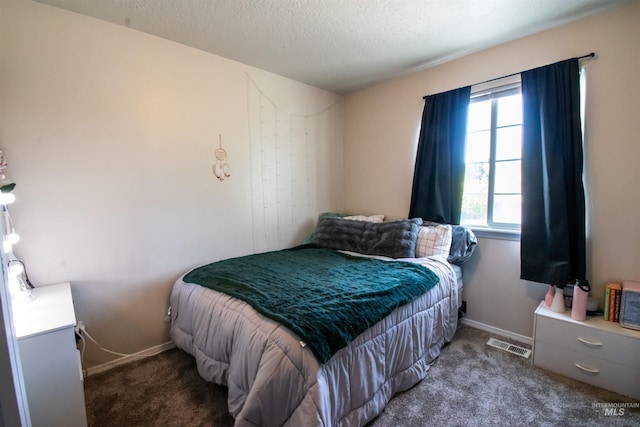 8340 E Expedition, Nampa, ID 83687 - carpeted bedroom with baseboards and a textured ceiling