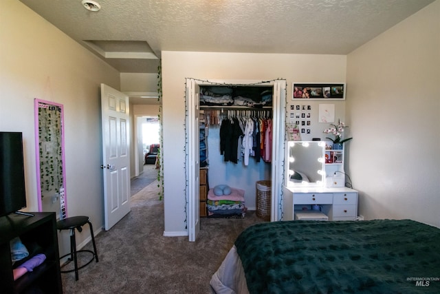 8340 E Expedition, Nampa, ID 83687 - bedroom with carpet flooring, a textured ceiling, and a closet