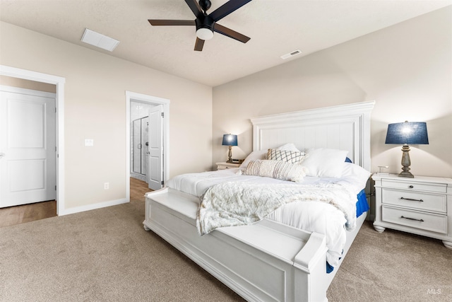 carpeted bedroom featuring ceiling fan