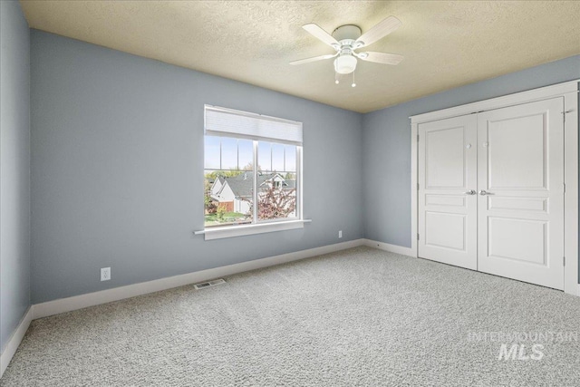 568 S Wooddale Pl, Eagle, ID 83616 - unfurnished bedroom with a closet, visible vents, carpet flooring, and baseboards