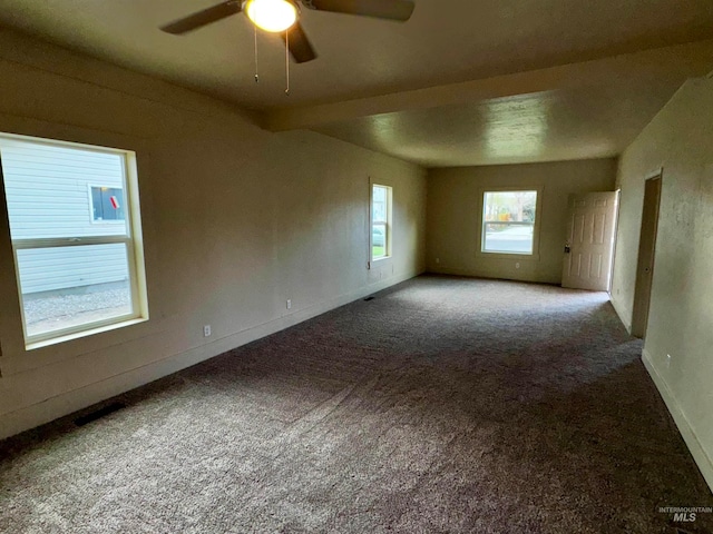 unfurnished room featuring baseboards, ceiling fan, and carpet flooring