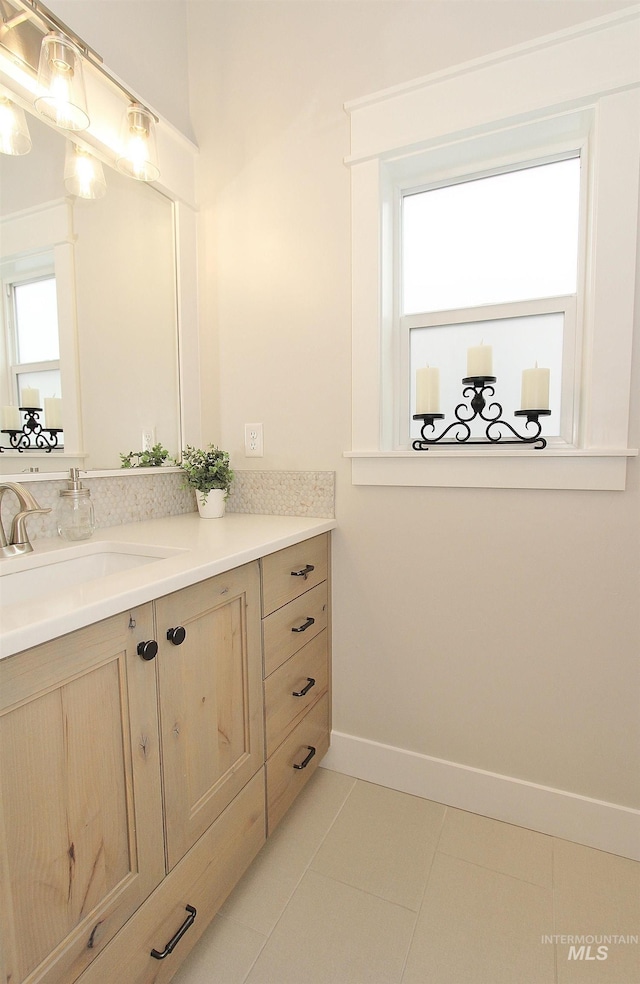 520 S Prospector Ln, Eagle, ID 83616 - bathroom featuring tile patterned floors, vanity, and baseboards