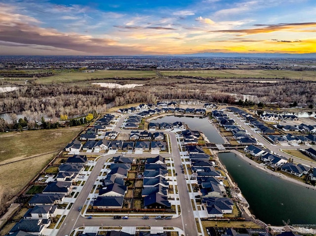 520 S Prospector Ln, Eagle, ID 83616 - aerial view at dusk of a water view and a residential view
