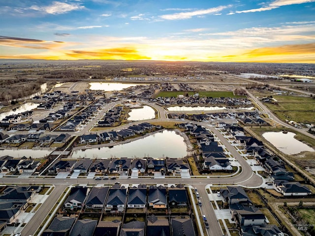 520 S Prospector Ln, Eagle, ID 83616 - aerial view at dusk of a residential view and a water view