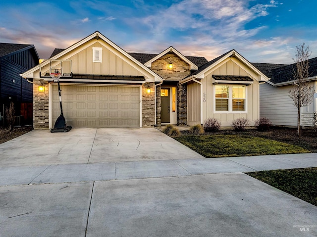 520 S Prospector Ln, Eagle, ID 83616 - view of front of house featuring board and batten siding, concrete driveway, a garage, and a front yard