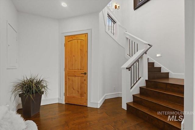 foyer featuring dark hardwood / wood-style floors