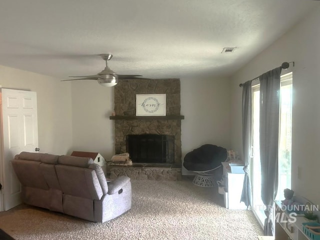 2315 NW 14th St, Meridian, ID 83646 - carpeted living room with ceiling fan and a stone fireplace