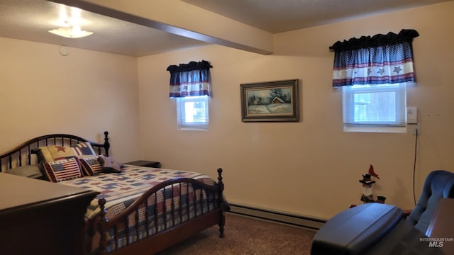 carpeted bedroom with a baseboard radiator