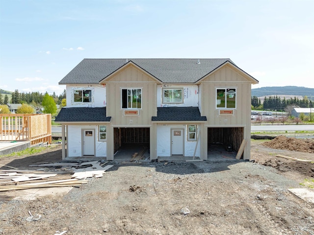 2827 Cyprus, Moscow, ID 83843 - view of front of house with a shingled roof and board and batten siding