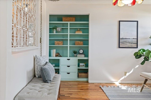 living area with wood finished floors