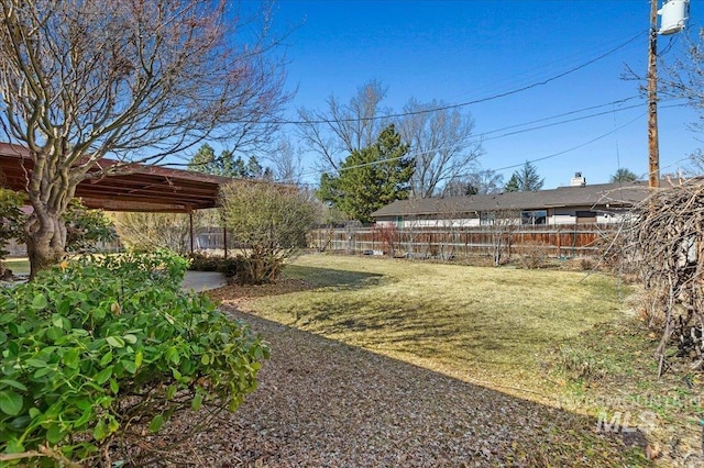 view of yard with fence