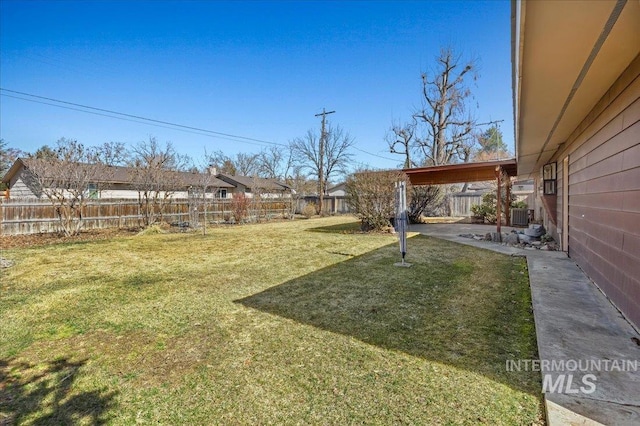 view of yard with a fenced backyard