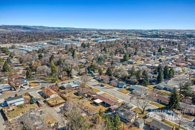 aerial view with a mountain view and a residential view