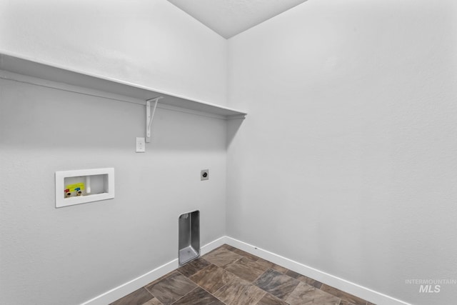 washroom with washer hookup, baseboards, laundry area, and electric dryer hookup