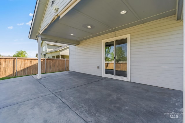 view of patio with fence