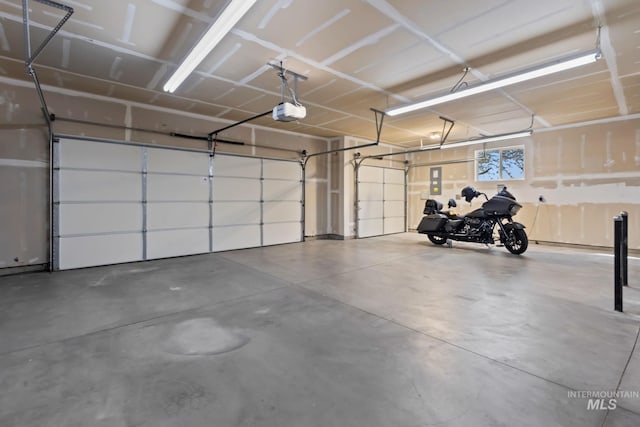 garage featuring a garage door opener