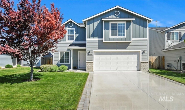 view of front of property with board and batten siding, concrete driveway, brick siding, and a garage