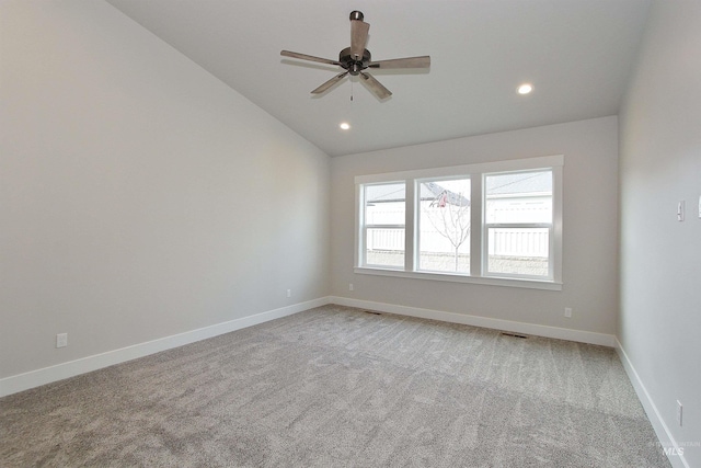 4658 S Hennessy Ave, Meridian, ID 83642 - spare room with lofted ceiling, light colored carpet, ceiling fan, baseboards, and recessed lighting