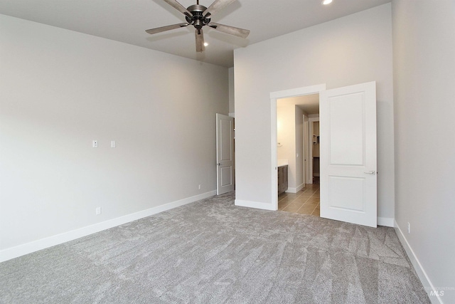 4658 S Hennessy Ave, Meridian, ID 83642 - unfurnished bedroom featuring baseboards, recessed lighting, ensuite bathroom, and light colored carpet