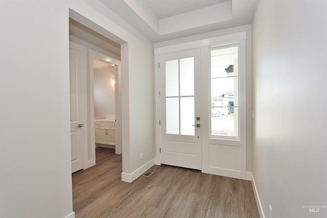 4658 S Hennessy Ave, Meridian, ID 83642 - doorway to outside with baseboards, visible vents, and wood finished floors