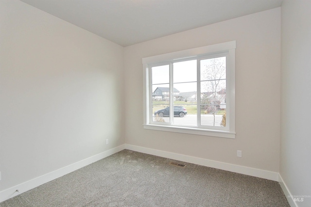 4658 S Hennessy Ave, Meridian, ID 83642 - carpeted spare room with visible vents and baseboards