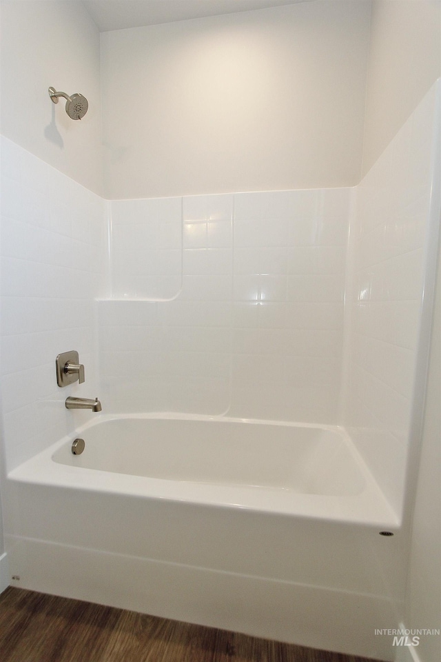 4658 S Hennessy Ave, Meridian, ID 83642 - bathroom with wood finished floors and tub / shower combination