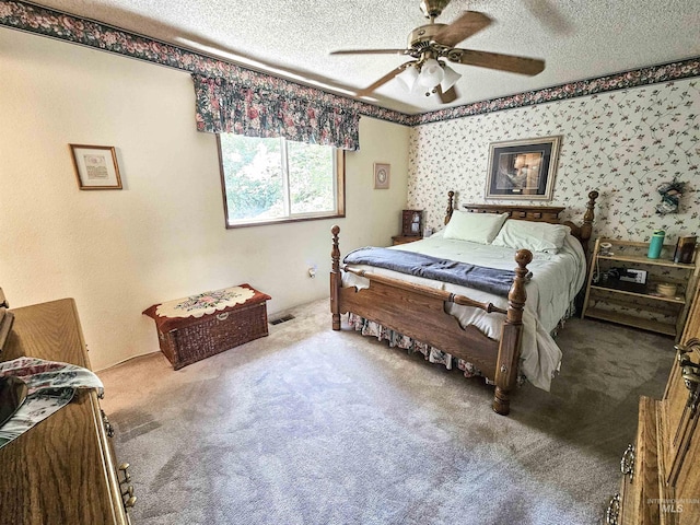 409 Garfield St, Asotin, WA 99402 - carpeted bedroom with a textured ceiling and a ceiling fan