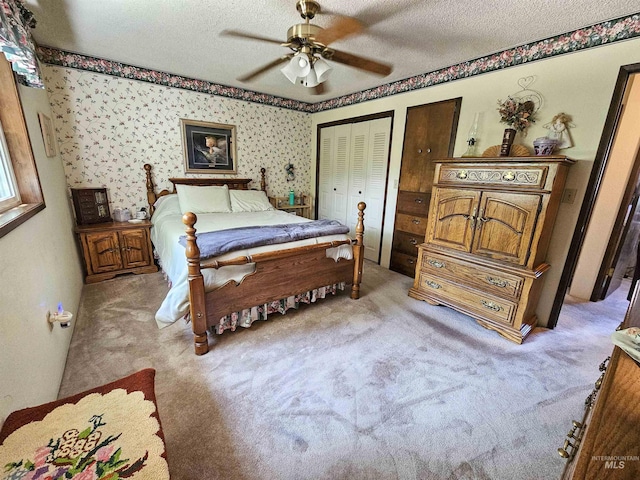 409 Garfield St, Asotin, WA 99402 - bedroom featuring carpet floors, a textured ceiling, and ceiling fan