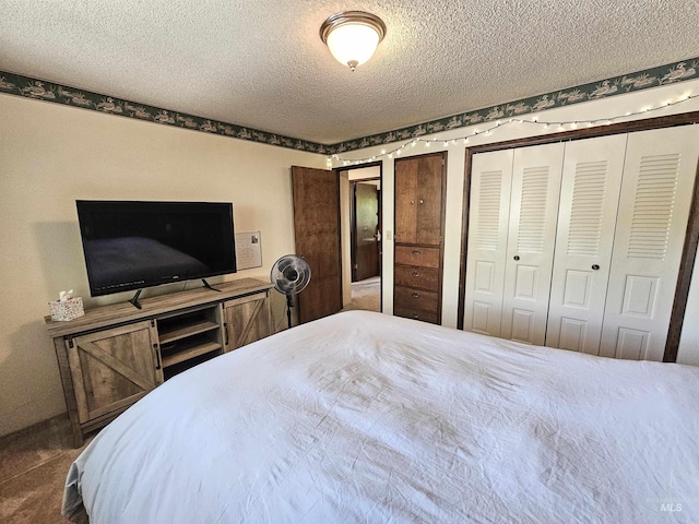 409 Garfield St, Asotin, WA 99402 - carpeted bedroom featuring a textured ceiling