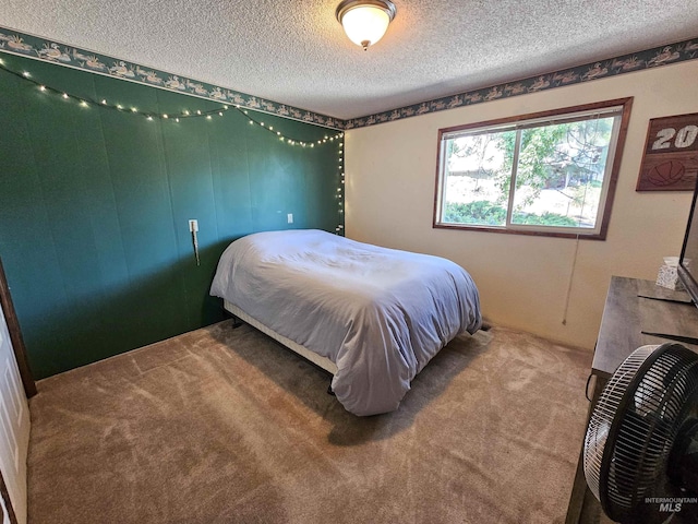 409 Garfield St, Asotin, WA 99402 - carpeted bedroom featuring a textured ceiling