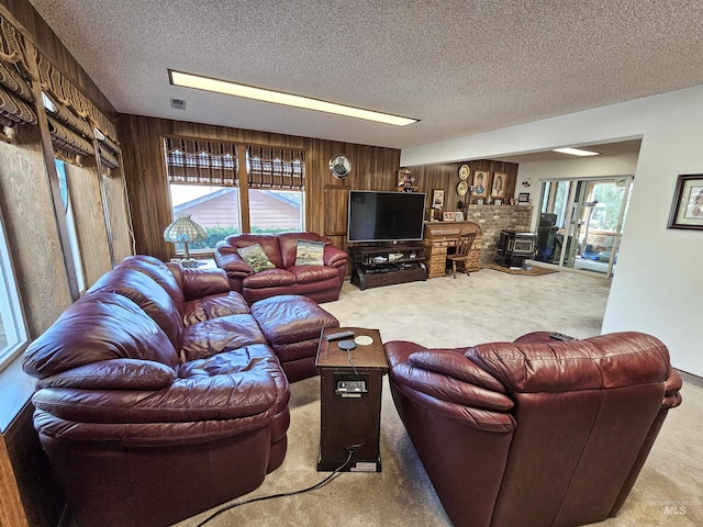 409 Garfield St, Asotin, WA 99402 - carpeted living room with a textured ceiling and wood walls