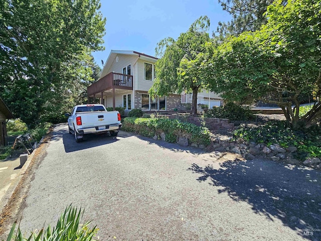 409 Garfield St, Asotin, WA 99402 - view of front of home with driveway and a balcony
