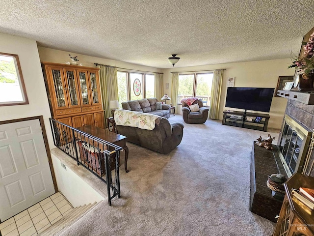 409 Garfield St, Asotin, WA 99402 - carpeted living area with a fireplace and a textured ceiling